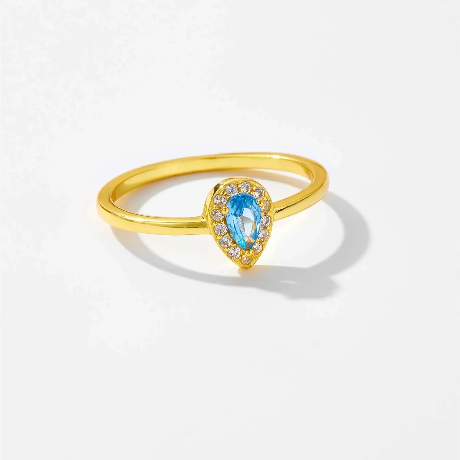 Фин регулируем сребърен пръстен с овални сини цирконии и златист акцент