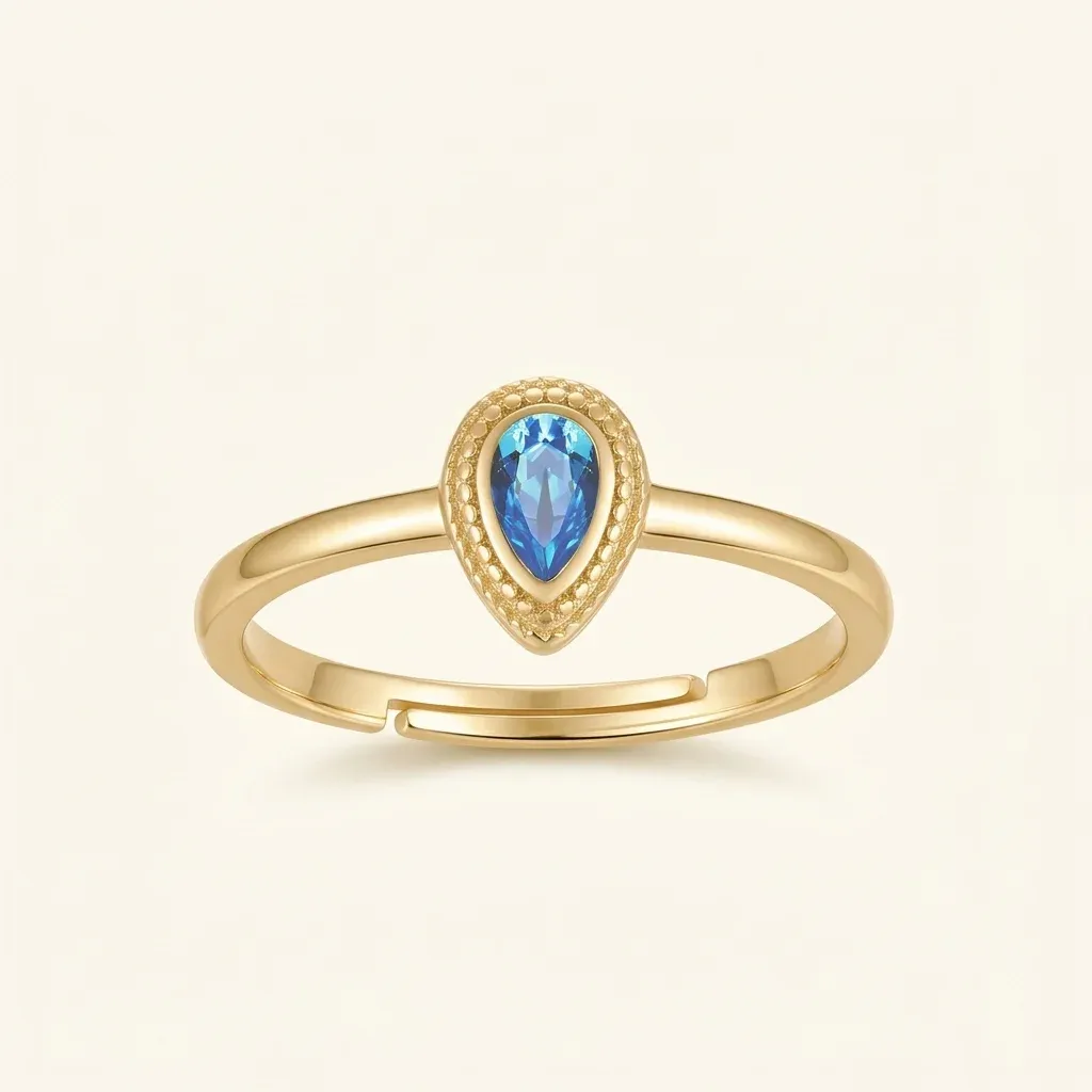 Регулируем златист пръстен със син циркон