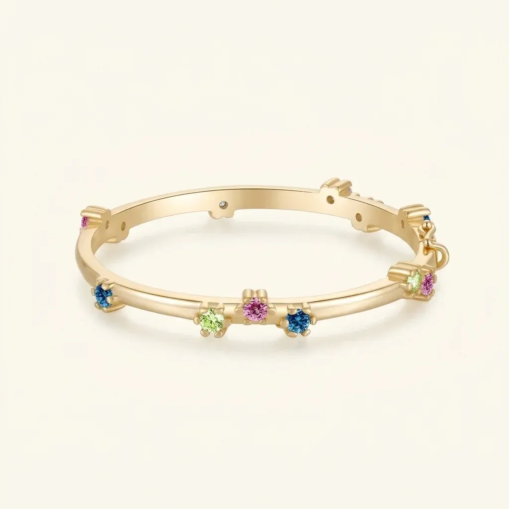 Златиста гривна с цветни циркони